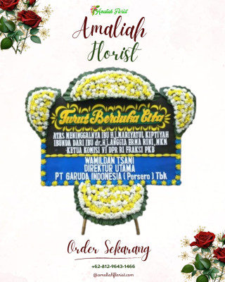 Papan Bunga Duka di Punia