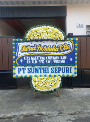 Papan Bunga Duka di Punia
