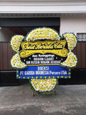Papan Bunga Duka di Punia