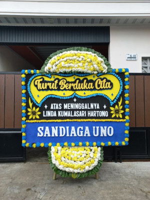 Papan Bunga Duka di Punia